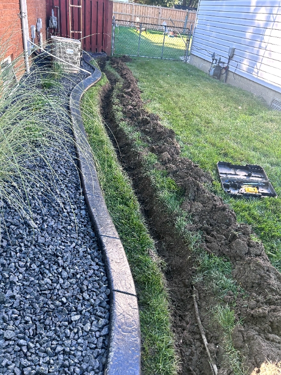 Truck pouring concrete walkway