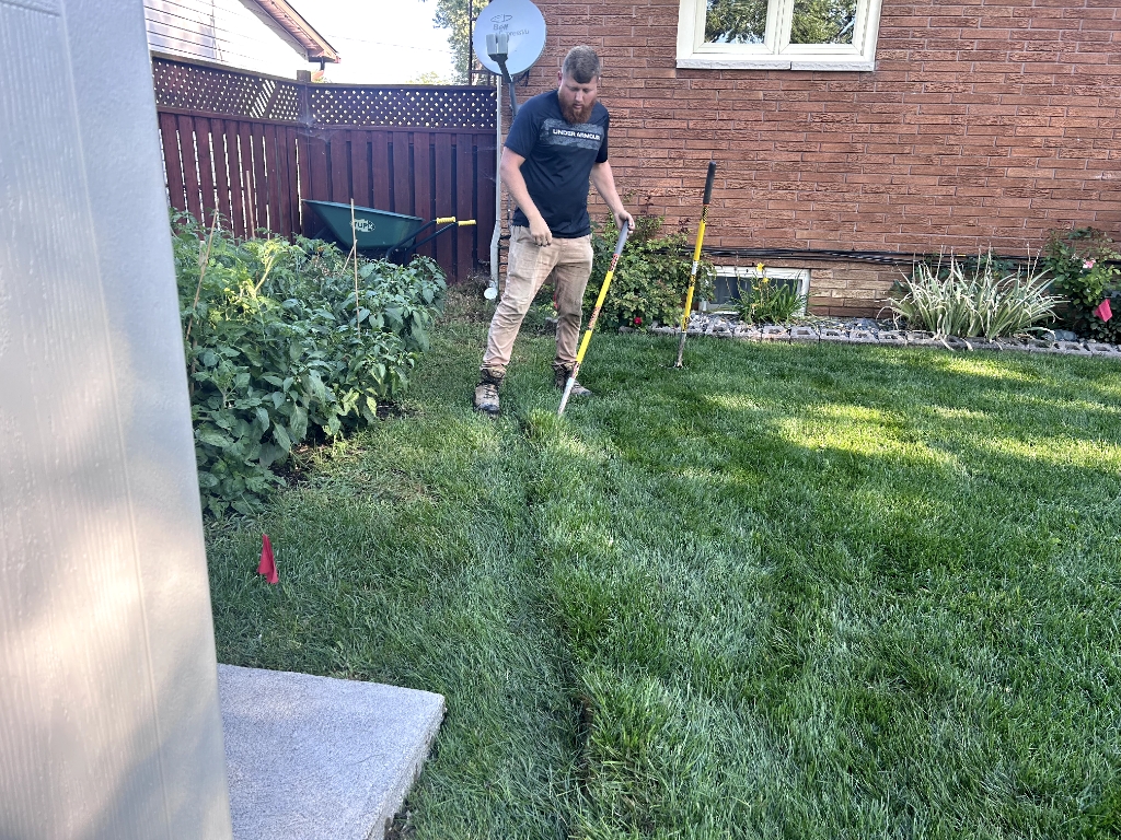 Truck pouring concrete walkway